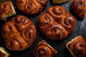 Fresh bread from the oven. Traditional cheese pie from Romania called Saralie. Homemade bread made from white wheat flour. photo