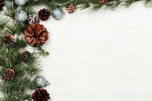 New Year or New Year's Eve background with fir branch with cones. The year 2023 is coming. photo