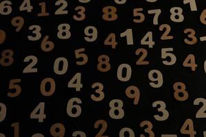 Background of numbers. from zero to nine. Numbers texture. Finance data concept. Mathematic. Seamless pattern with numbers. financial crisis concept. Business success. photo