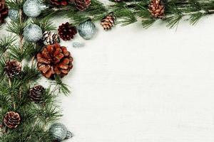 New Year or New Year's Eve background with fir branch with cones. The year 2023 is coming. photo