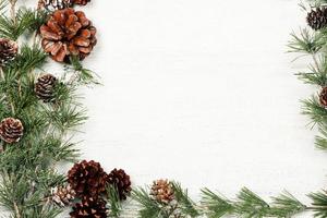 New Year or New Year's Eve background with fir branch with cones. The year 2023 is coming. photo