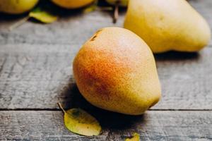 Food Background. Fresh Organic Ripe Pears Wooden Table. photo