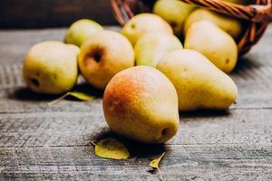 Food Background. Fresh Organic Ripe Pears Wooden Table photo