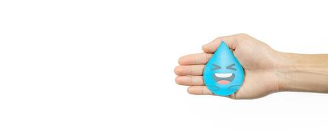 Hands holding water drop paper cut, Washing hand, Hand sanitizer and Hygiene. World water day, Saving water and world environmental protection concept photo