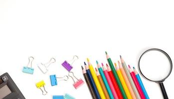 Back to school concept,.Flalt lay with pencil,magnifier,paper clips,calculator.Copyspace banner photo