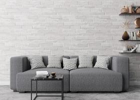 Empty white brick wall in modern living room. Mock up interior in contemporary style. Free space, copy space for your picture, text, or another design. Sofa, table, shelves. 3D rendering. photo