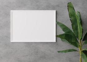 Empty, white, horizontal picture frame on concrete wall. Mock up interior in minimalist, contemporary style. Free, copy space for your picture, poster. Banana plant. 3D rendering. photo