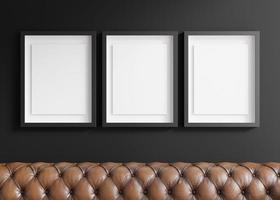 Three blank vertical picture frames hanging on black wall. Template, mock up for artwork, picture or poster. Empty, copy space. Close up view. Simple, minimalist mockup. 3D rendering. photo