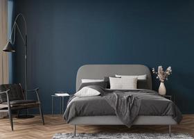 Empty dark blue wall in modern and cozy bedroom. Mock up interior in contemporary style. Free, copy space for your picture, text, or another design. Bed, vase, armchair. 3D rendering. photo