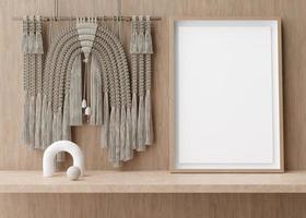 Empty vertical picture frame standing on shelve in modern room. Mock up interior in contemporary, boho style. Free, copy space for picture. Sculpture, macrame. 3D rendering. photo