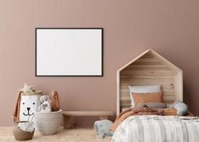 Empty horizontal picture frame on brown wall in modern child room. Mock up interior in scandinavian style. Free, copy space for your picture, poster. Bed, toys. Cozy room for kids. 3D rendering. photo