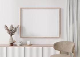 Empty horizontal picture frame on white wall in modern living room. Mock up interior in minimalist, contemporary style. Free space for your picture, poster. Console, pampas grass in vase. 3D rendering photo