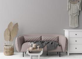 Empty gray wall in modern living room. Mock up interior in scandinavian, boho style. Free, copy space for your picture, text, or another design. Sofa, console, macrame, rattan basket. 3D rendering. photo