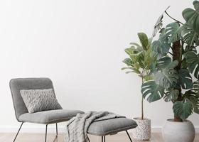 Empty white wall in modern living room. Mock up interior in contemporary, scandinavian style. Free, copy space for picture, poster, text, or another design. Armchair, plants. 3D rendering. photo