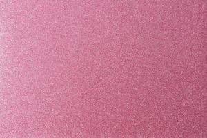 Pink shiny and glittering surface. Abstract background. Events, celebrations. Trendy backdrop for your design. Texture with glitter. photo