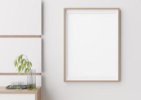 Blank vertical picture frame hanging on white wall. Template, mock up for your artwork, picture or poster. Empty, copy space. Close up view. Simple, minimalist mockup. 3D rendering. photo