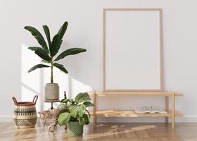 Empty vertical picture frame. Mock up interior in boho style. Free, copy space for picture or poster. Plants, rattan basket, cat. Close-up view. 3D rendering. photo