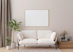 Empty horizontal picture frame on cream wall in modern living room. Mock up interior in scandinavian style. Free, copy space for your picture, poster. Sofa, table, dried grass, books. 3D rendering. photo