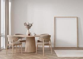 Empty vertical picture frame standing on parquet floor in modern living room. Mock up interior in scandinavian, boho style. Free, copy space for picture. Table, chairs, pampas grass. 3D rendering. photo