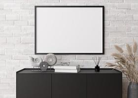 Empty horizontal picture frame on white brick wall in modern living room. Mock up interior in contemporary style. Free, copy space for picture, poster. Console, sculptures, pampas grass. 3D rendering. photo