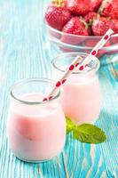 Strawberry milkshake in the glass jar photo