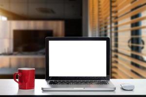 workspace with computer, laptop, office supplies, and coffee cup, at office. desk work concept. photo