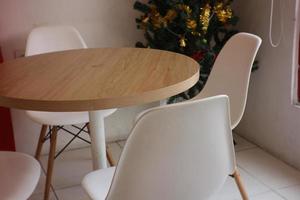 Empty chairs and tables at an ice cone shop photo