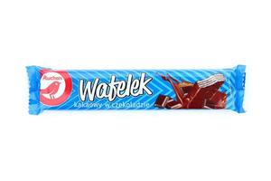 KHARKOV, UKRAINE - JANUARY 3, 2021 Wafelek chocolate wafer product by Auchan, a French multinational retail group in Croix, France photo