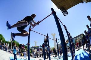 KHARKIV, UKRAINE - 27 MAY, 2018 Street workout show during the annual festival of street cultures photo