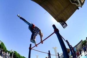 KHARKIV, UKRAINE - 27 MAY, 2018 Street workout show during the annual festival of street cultures photo