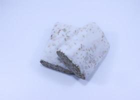 High Angle View Of Tempeh isolated on white background photo