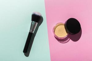 Mineral face powder and brush. Eco-friendly and organic beauty products photo