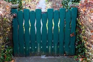 low garden gate in autumn photo