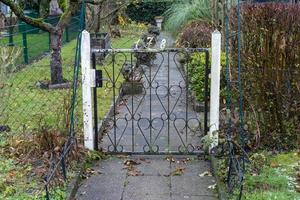 low garden gate in autumn photo