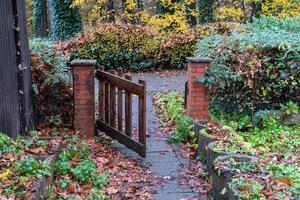 low garden gate in autumn photo