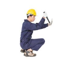 Handyman in uniform with his hammer photo