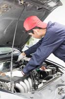 Auto mechanic check engine car photo