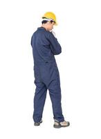 Workman with blue coveralls and hardhat in a uniform with clipping path photo