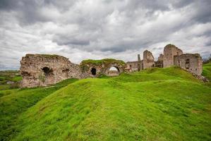 Ruins of the Skala-Podilsky castle against a cloudy sky in the Ternopil region. Ukraine photo