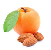 Apricots with almonds nuts photo