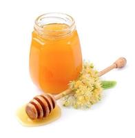 Honey with linden flowers photo