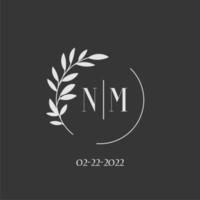 inspiración para el diseño del logotipo del monograma de la boda de la letra inicial nm vector