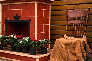 Cozy interior with fireplace.  Christmas decor. photo