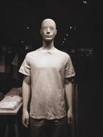 Men's casual clothing store, male dummy in t-shirt, closeup photo