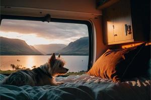 A dog sits in a cozy campervan with a beautiful view of the Scottish Highlands and a Loch in Scotland West highland Terrier looks comfy photo