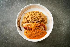 grilled chicken steak with red curry sauce and rice photo
