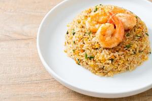 fried shrimps fried rice on plate photo