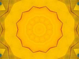 Yellow feather kaleidoscope floral pattern with some blue and red color. Abstract unique and aesthetic background. photo