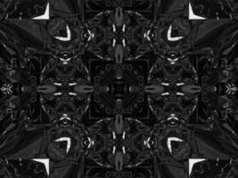Black silver metalic kaleidoscope background. Abstract and symmetric pattern with dark vibes. photo