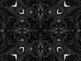 Black silver metalic kaleidoscope background. Abstract and symmetric pattern with dark vibes. photo